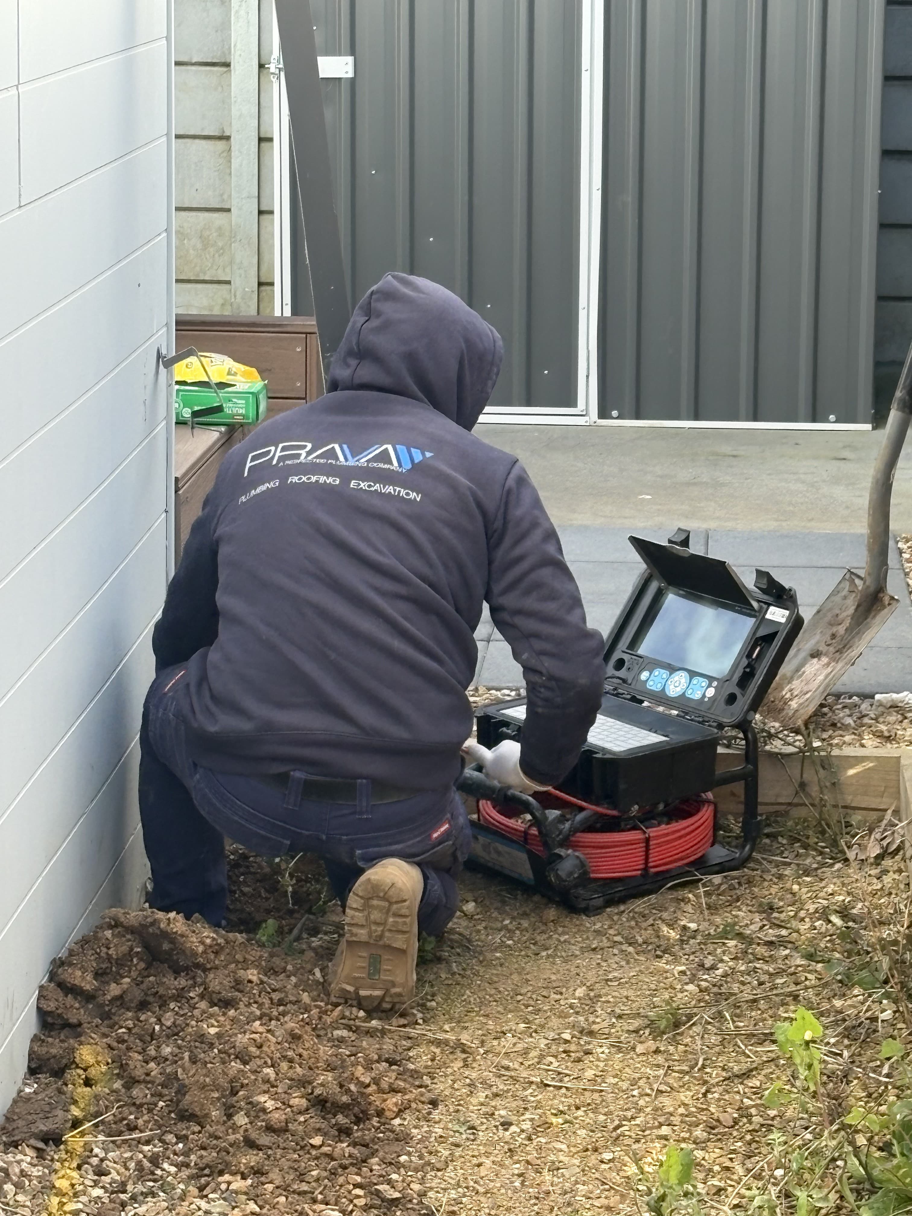 CCTV drain camera set up for an underground pipe inspection