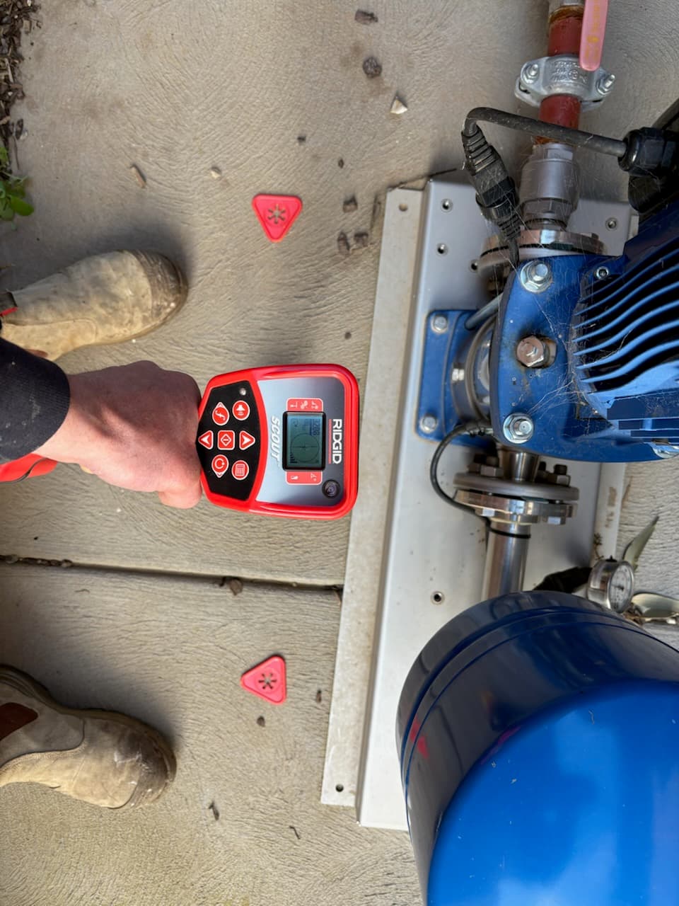 Electronic locator used to trace a line near a pump station