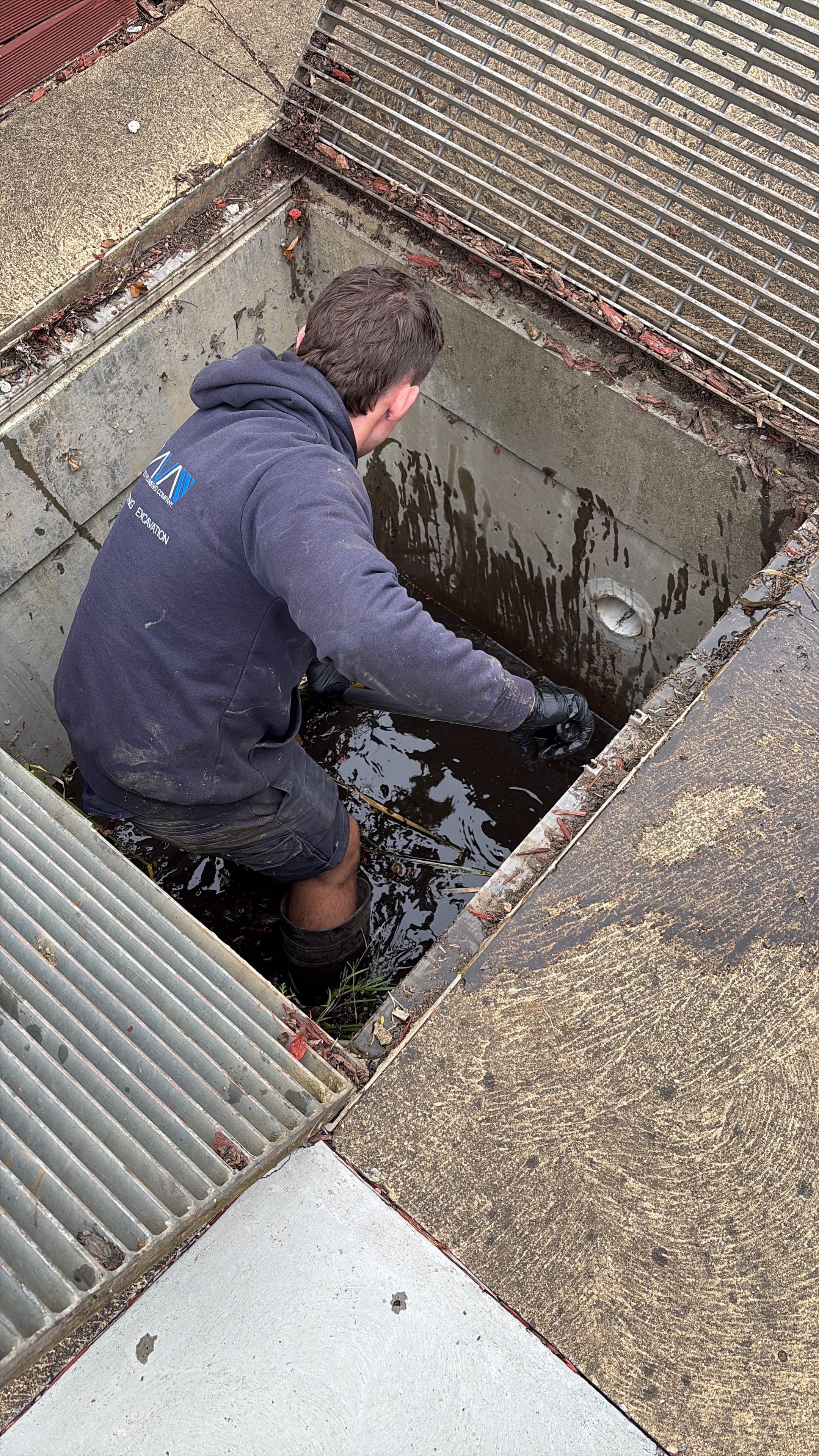Prava technician clearing a blocked stormwater pit