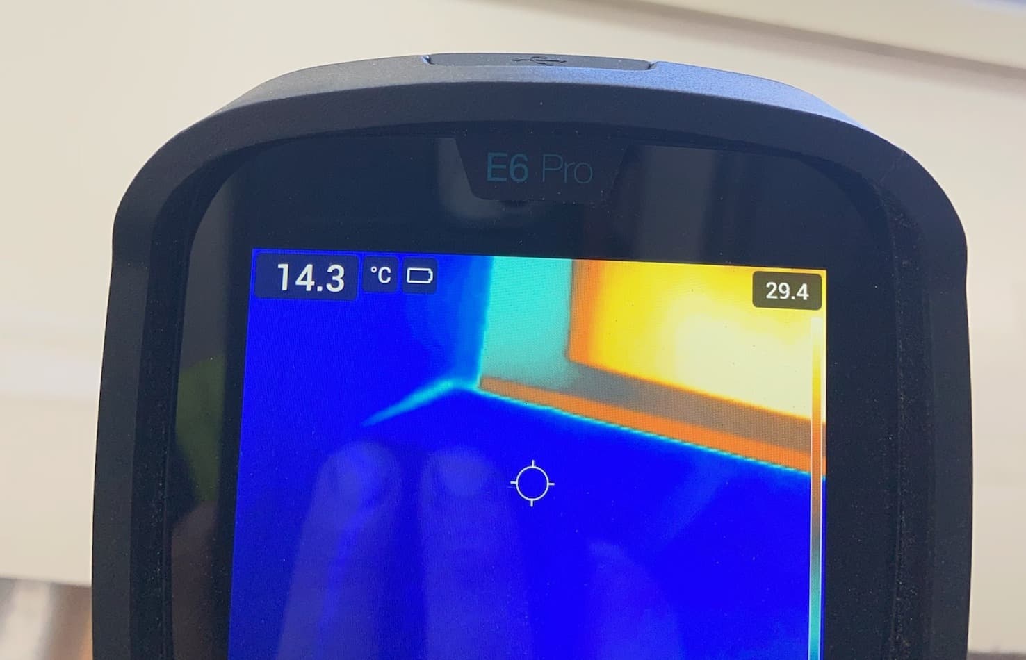 Thermal imaging camera reading a temperature variance near a window